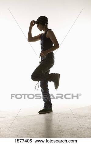 a boy dancing with headphones View Large Photo Image Stock Photography - a boy dancing with headphones. Fotosearch