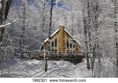 Stock Image - a house in the winter; canton de shefford, quebec, canada. Fotosearch