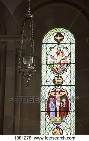 a light fixture and stained glass window in howick church; northumberland, england View Large Photo Image Stock Photo - a light fixture and stained glass window in howick church; northumberland, england. Fotosearch