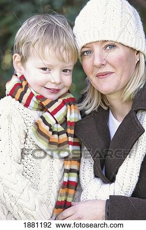 a mother and son wearing scarves and a toque; portland, oregon, united states of america View Large Photo Image Stock Image - a mother and son wearing scarves and a toque; portland, oregon, united states of america. Fotosearch