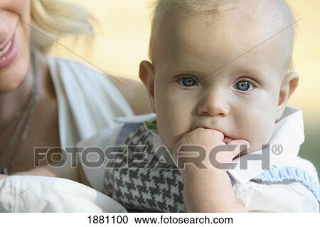 a mother holding her son; gresham, oregon, united states of america View Large Photo Image Stock Image - a mother holding her son; gresham, oregon, united states of america. Fotosearch