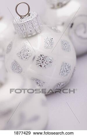 a white and silver christmas ball; edmonton, alberta, canada View Large Photo Image Stock Photo - a white and silver christmas ball; edmonton, alberta, canada. Fotosearch
