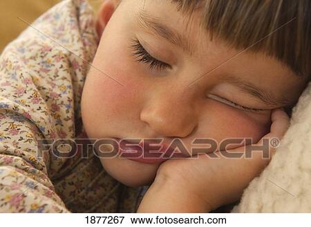 a young girl sleeping View Large Photo Image Stock Photo - a young girl sleeping. Fotosearch