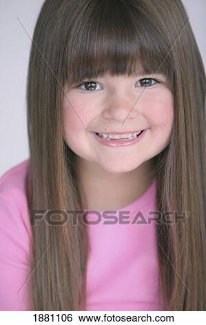 Stock Photograph - a young girl with long hair. Fotosearch