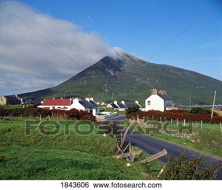 Stock Photograph - Achill Island, Co Mayo, Ireland; Doogort Village And Slievemore Mountain. Fotosearch