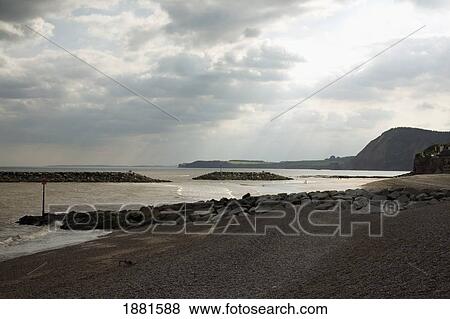 Stock Photo - along the shoreline; sidmouth, devon, england. Fotosearch