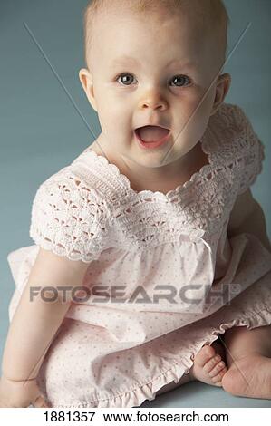 Stock Photo - baby girl smiling. Fotosearch