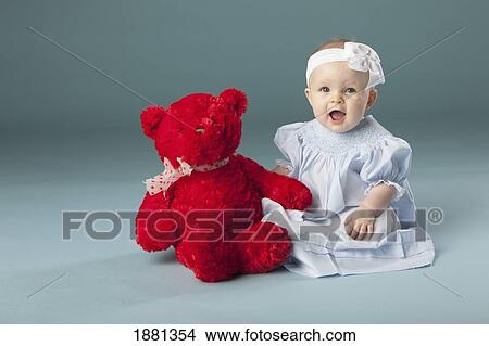 baby girl with a teddy bear View Large Photo Image Picture - baby girl with a teddy bear. Fotosearch