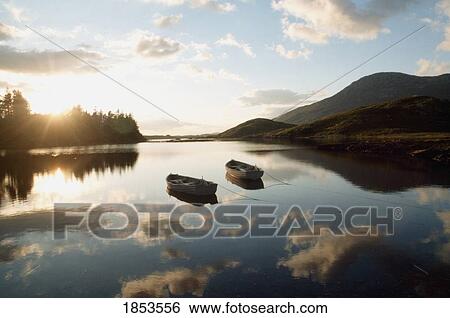 Boats On Ballynahinch Lake, Ballynahinch, County Galway, Ireland View Large Photo Image Stock Photograph - Boats On Ballynahinch Lake, Ballynahinch, County Galway, Ireland. Fotosearch