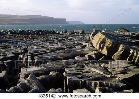 Co. Clare, The Burren, With Distant Cliffs Of Moher, Co Clare, Ireland View Large Photo Image Stock Image - Co. Clare, The Burren, With Distant Cliffs Of Moher, Co Clare, Ireland. Fotosearch