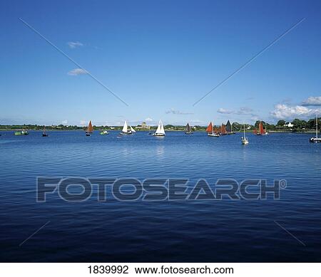Stock Image - Co Galway, Kinvarra, Meeting Of The Boats Race. Fotosearch