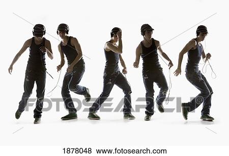 composite image of a boy dancing with headphones; edmonton, alberta, canada View Large Photo Image Stock Photo - composite image of a boy dancing with headphones; edmonton, alberta, canada. Fotosearch