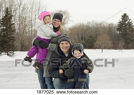 edmonton, alberta, canada; a family on an outdoor ice rink View Large Photo Image Stock Photography - edmonton, alberta, canada; a family on an outdoor ice rink. Fotosearch