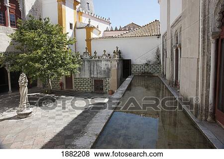 Stock Photo - facade of the water grotto in the main courtyard of sintra national palace; sintra, portugal. Fotosearch