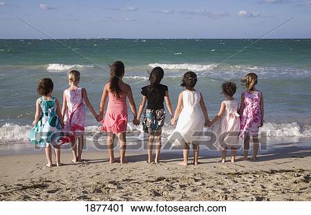 havana, cuba; young girls holding hands facing the ocean View Large Photo Image Stock Image - havana, cuba; young girls holding hands facing the ocean. Fotosearch