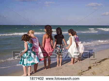 havana, cuba; young girls holding hands facing the ocean View Large Photo Image Stock Image - havana, cuba; young girls holding hands facing the ocean. Fotosearch