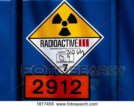 Stock Photo - Hazard Sign On Container Of Partially Refined Uranium Ore.. Fotosearch
