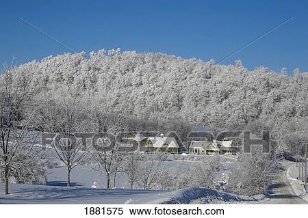 houses covered in snow in the winter; iron hill, quebec, canada View Large Photo Image Stock Photography - houses covered in snow in the winter; iron hill, quebec, canada. Fotosearch