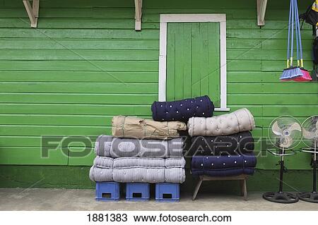 Stock Image - items in a store on a street; livingston, guatemala. Fotosearch
