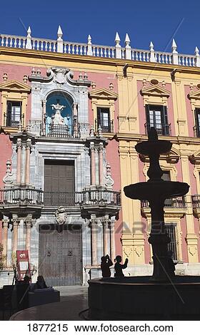 Malaga, Spain; tourists taking pictures in front of the 18th century baroque bishop's palace in plaza del obispo (palacio episcopal) View Large Photo Image Stock Photography - Malaga, Spain; tourists taking pictures in front of the 18th century baroque bishop's palace in plaza del obispo (palacio episcopal). Fotosearch