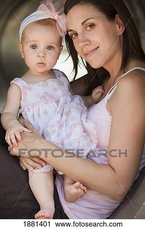 Stock Image - mother and daughter together. Fotosearch