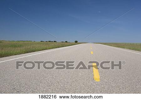 paved road with yellow stripe lines; alberta, canada View Large Photo Image Stock Photograph - paved road with yellow stripe lines; alberta, canada. Fotosearch