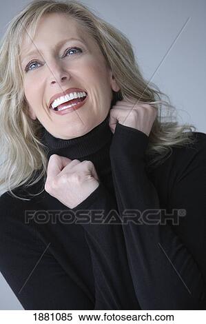 Stock Photography - portrait of a woman smiling. Fotosearch