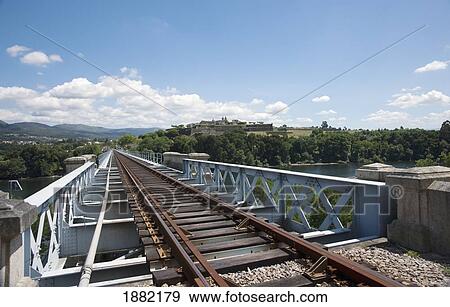 rail tracks on top of eiffel bridge looking towards portugal; tui, pontevedra, spain View Large Photo Image Stock Photo - rail tracks on top of eiffel bridge looking towards portugal; tui, pontevedra, spain. Fotosearch