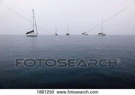 rainy day on the ocean; belize View Large Photo Image Stock Image - rainy day on the ocean; belize. Fotosearch