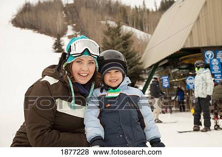 red deer, alberta, canada; a mother with her young son at a ski area View Large Photo Image Stock Photo - red deer, alberta, canada; a mother with her young son at a ski area. Fotosearch