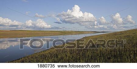 red river floodway with the clouds reflected in the water; winnipeg, manitoba, canada View Large Photo Image Stock Photography - red river floodway with the clouds reflected in the water; winnipeg, manitoba, canada. Fotosearch
