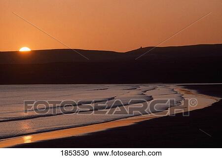 Stock Image - Seashore Sunset, Lahinch, County Clare, Ireland. Fotosearch