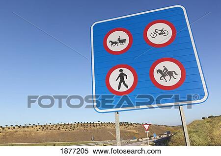 seville, spain; traffic sign on autovia a-66 near seville saying no horse-drawn traffic, bicycles, walking or horse riding View Large Photo Image Stock Photography - seville, spain; traffic sign on autovia a-66 near seville saying no horse-drawn traffic, bicycles, walking or horse riding. Fotosearch