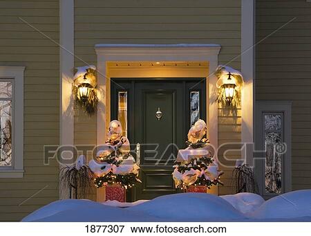 shefford, quebec, canada; a house and decorations covered in snow in the winter View Large Photo Image Stock Photo - shefford, quebec, canada; a house and decorations covered in snow in the winter. Fotosearch