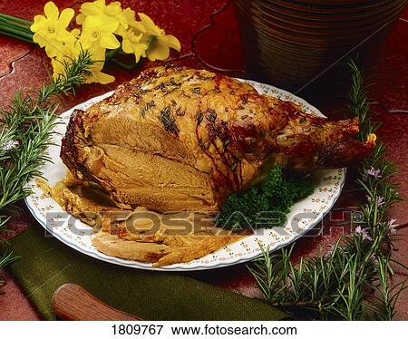 Stock Photo - Shoulder Of Lamb With Rosemary. Fotosearch