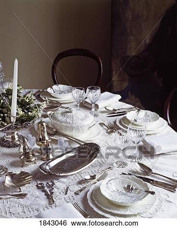 Stock Photograph - Silver Dinner Table Setting. Fotosearch