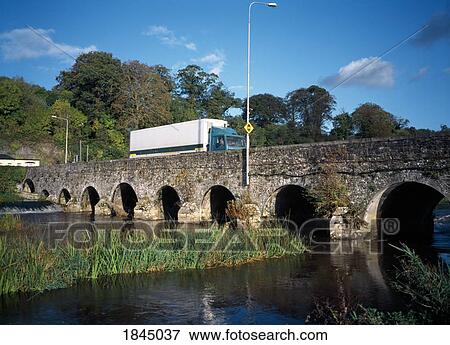 Stock Photo - Slane, Co Meath, Ireland; Truck On A Small Bridge. Fotosearch