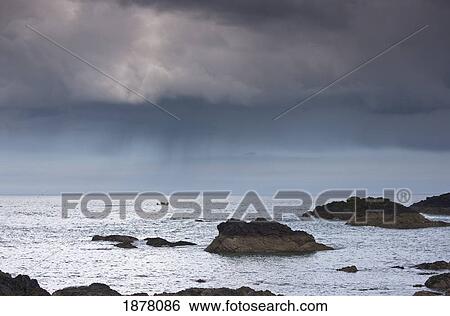 st. abb's head, scottish borders, scotland; large rocks in the water under dark clouds View Large Photo Image Stock Photograph - st. abb's head, scottish borders, scotland; large rocks in the water under dark clouds. Fotosearch