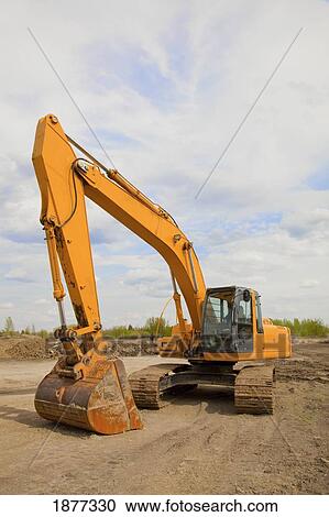 Stock Image - st. albert, alberta, canada; heavy equipment in a construction site. Fotosearch