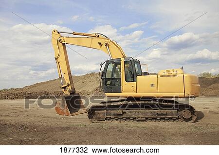 Stock Image - st. albert, alberta, canada; heavy equipment in a construction site. Fotosearch