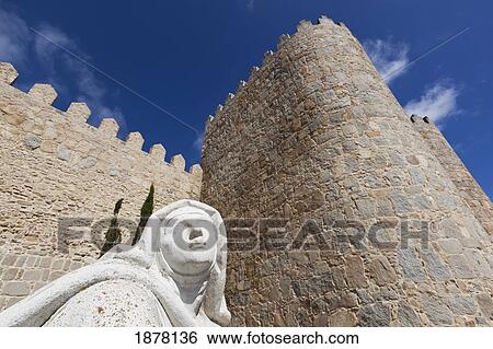 Stock Photograph - statue of saint teresa by the puerta del alcazar; avila, avila province, spain. Fotosearch