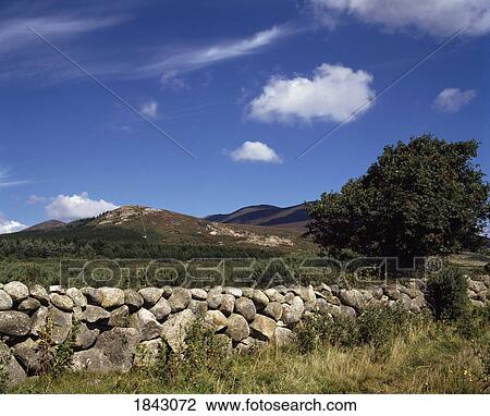 Stone Wall In Front Of Mountains View Large Photo Image Stock Image - Stone Wall In Front Of Mountains. Fotosearch