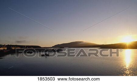 Sunset Over Valentia Island And Portmagee Harbour, Co Kerry, Ireland View Large Photo Image Stock Image - Sunset Over Valentia Island And Portmagee Harbour, Co Kerry, Ireland. Fotosearch