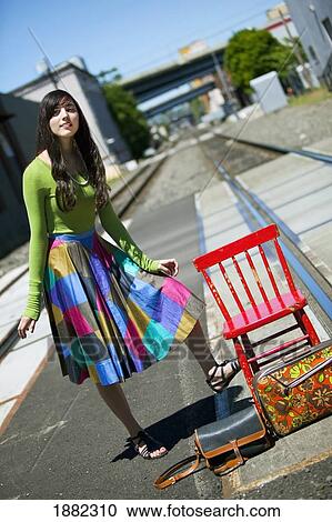 teenage girl waiting for the train in downtown: portland, oregon, united states of america View Large Photo Image Stock Image - teenage girl waiting for the train in downtown: portland, oregon, united states of america. Fotosearch