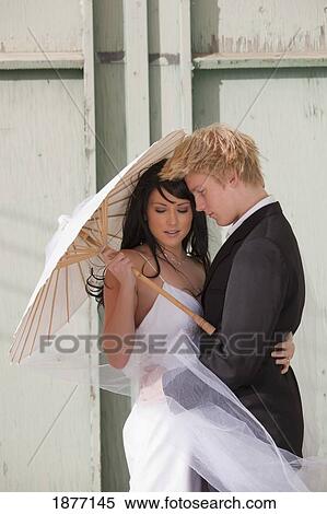 three hills, alberta, canada; a bride and groom View Large Photo Image Stock Photography - three hills, alberta, canada; a bride and groom. Fotosearch