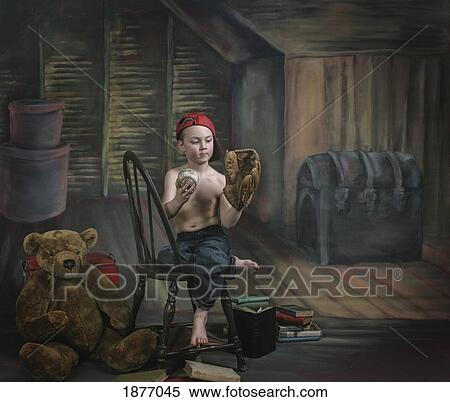victoria, british columbia, canada; a boy in the attic with old relics View Large Photo Image Stock Photography - victoria, british columbia, canada; a boy in the attic with old relics. Fotosearch