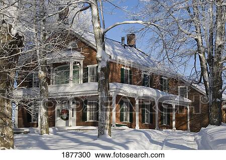 waterloo, quebec, canada; a house covered in snow in the winter View Large Photo Image Stock Image - waterloo, quebec, canada; a house covered in snow in the winter. Fotosearch