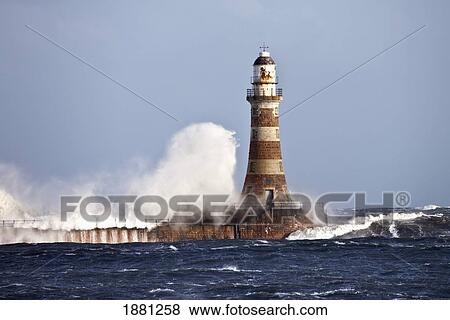 waves crashing against roker lighthouse; sunderland, tyne and wear, england View Large Photo Image Stock Photo - waves crashing against roker lighthouse; sunderland, tyne and wear, england. Fotosearch