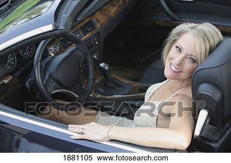 woman in a sports car; gresham, oregon, united states of america View Large Photo Image Stock Photography - woman in a sports car; gresham, oregon, united states of america. Fotosearch