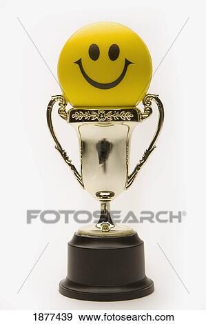 yellow happy face in a trophy; edmonton, alberta, canada View Large Photo Image Stock Photo - yellow happy face in a trophy; edmonton, alberta, canada. Fotosearch